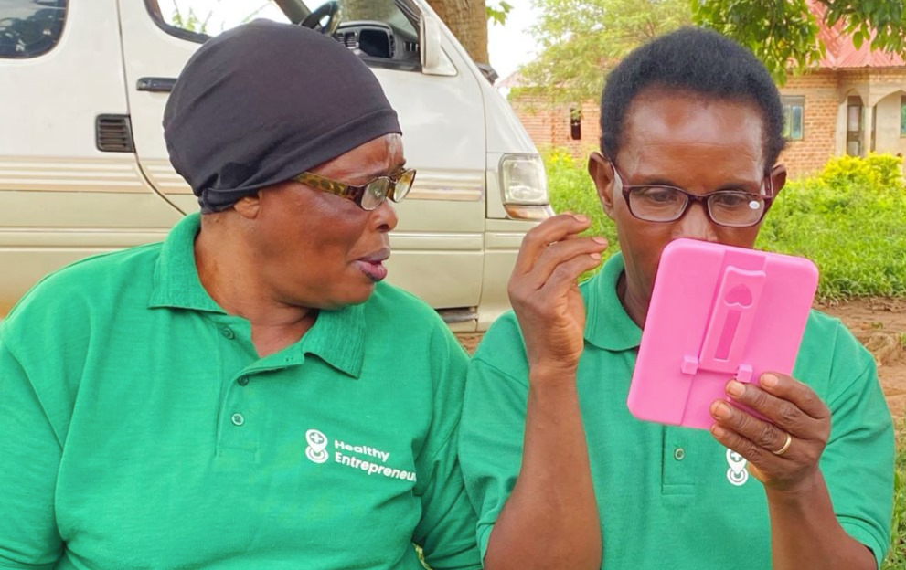Community Health Workers try out a new pair of glasses